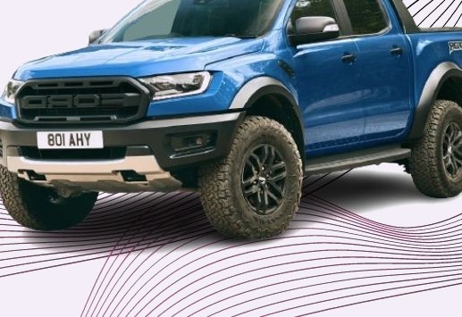 A blue Ford Ranger Raptor four-door pick-up truck